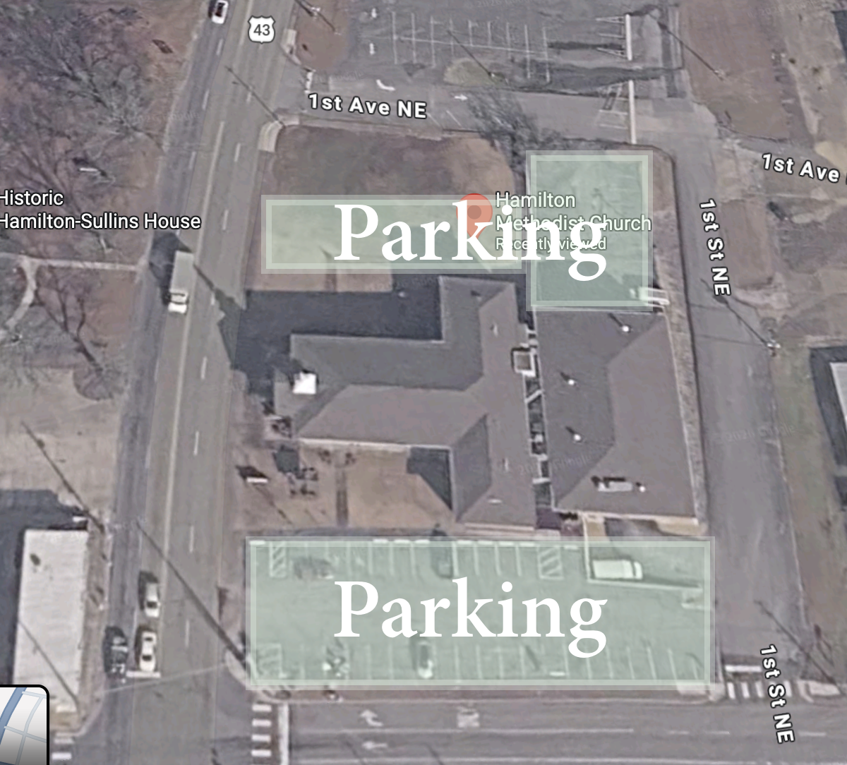 Aerial map of Hamilton Methodist Church showing parking areas highlighted in green along 1st Ave NE and behind the church off 1st St NE